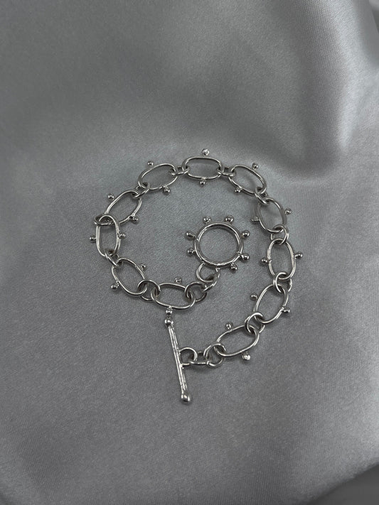 Silver chain bracelet with dot details