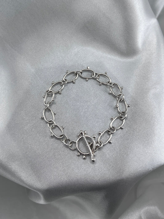 Silver chain bracelet with dot details