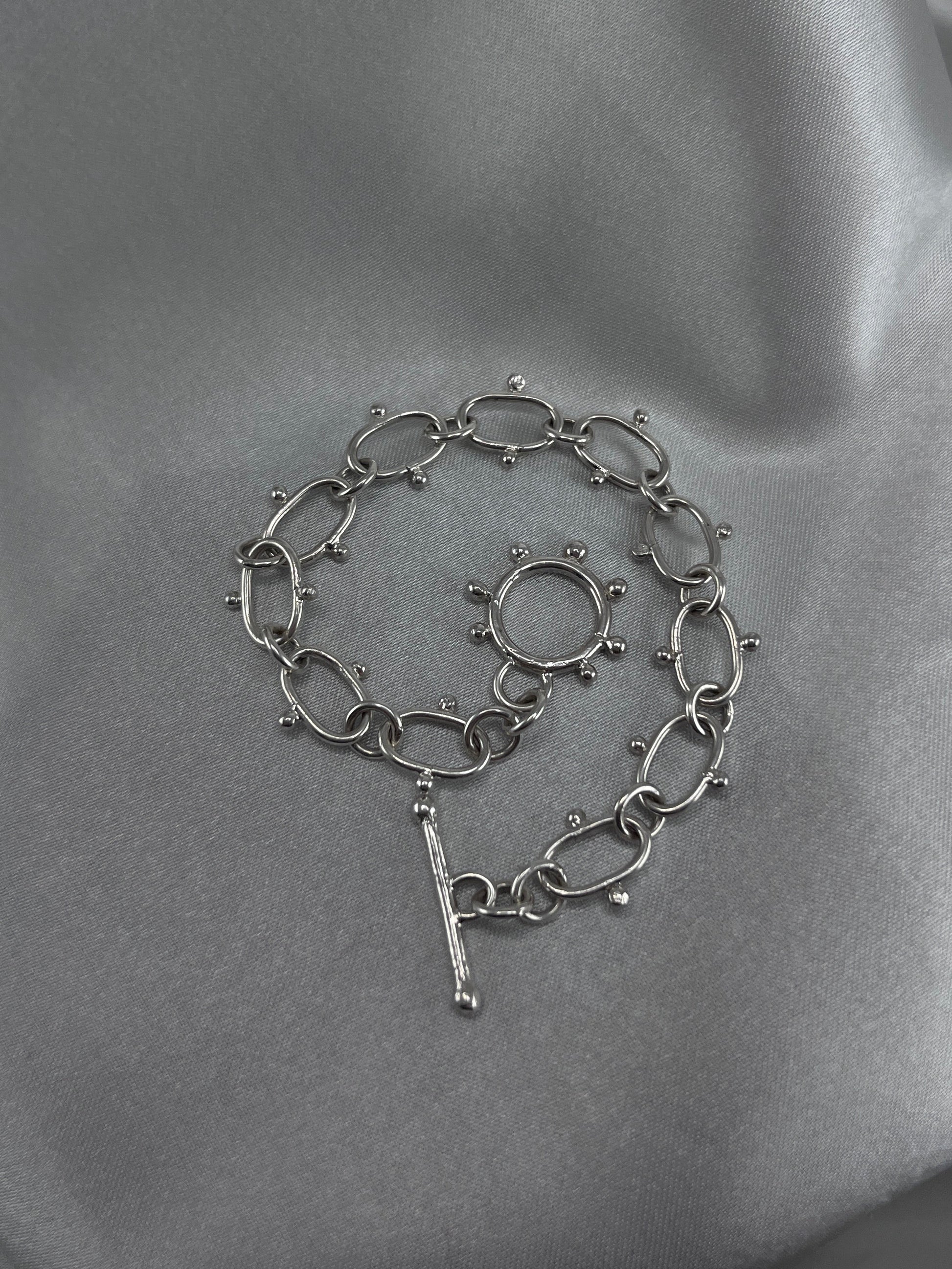 Silver chain bracelet with dot details